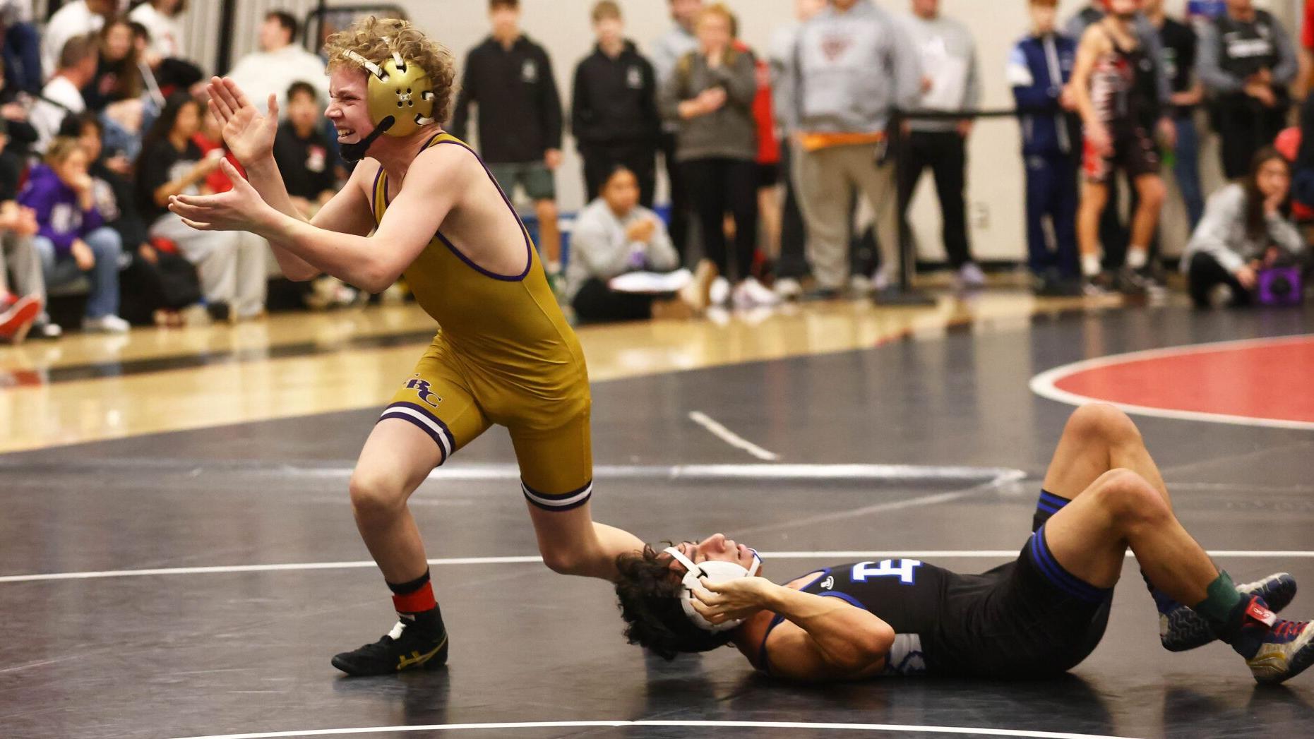 Scenes from the 63rd Red Schmitt Holiday boys wrestling tournament